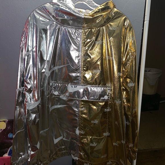 silver and gold nike jacket